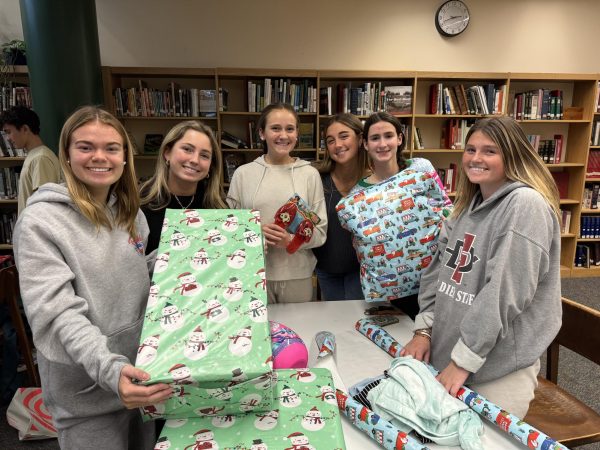 Student Government wrapping presents for Adopt-a-Family